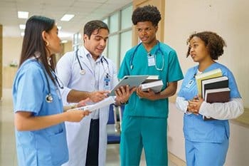 Doctor talking to nursing students